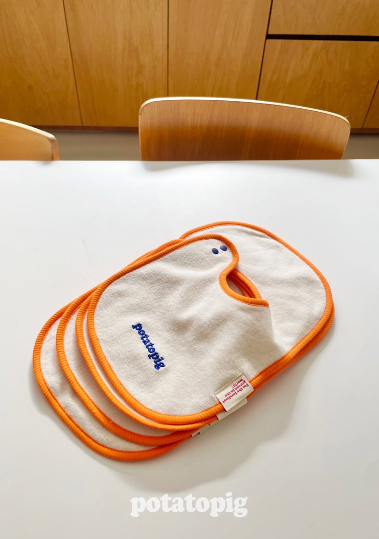 POTATO TERRY BIB - APRICOT