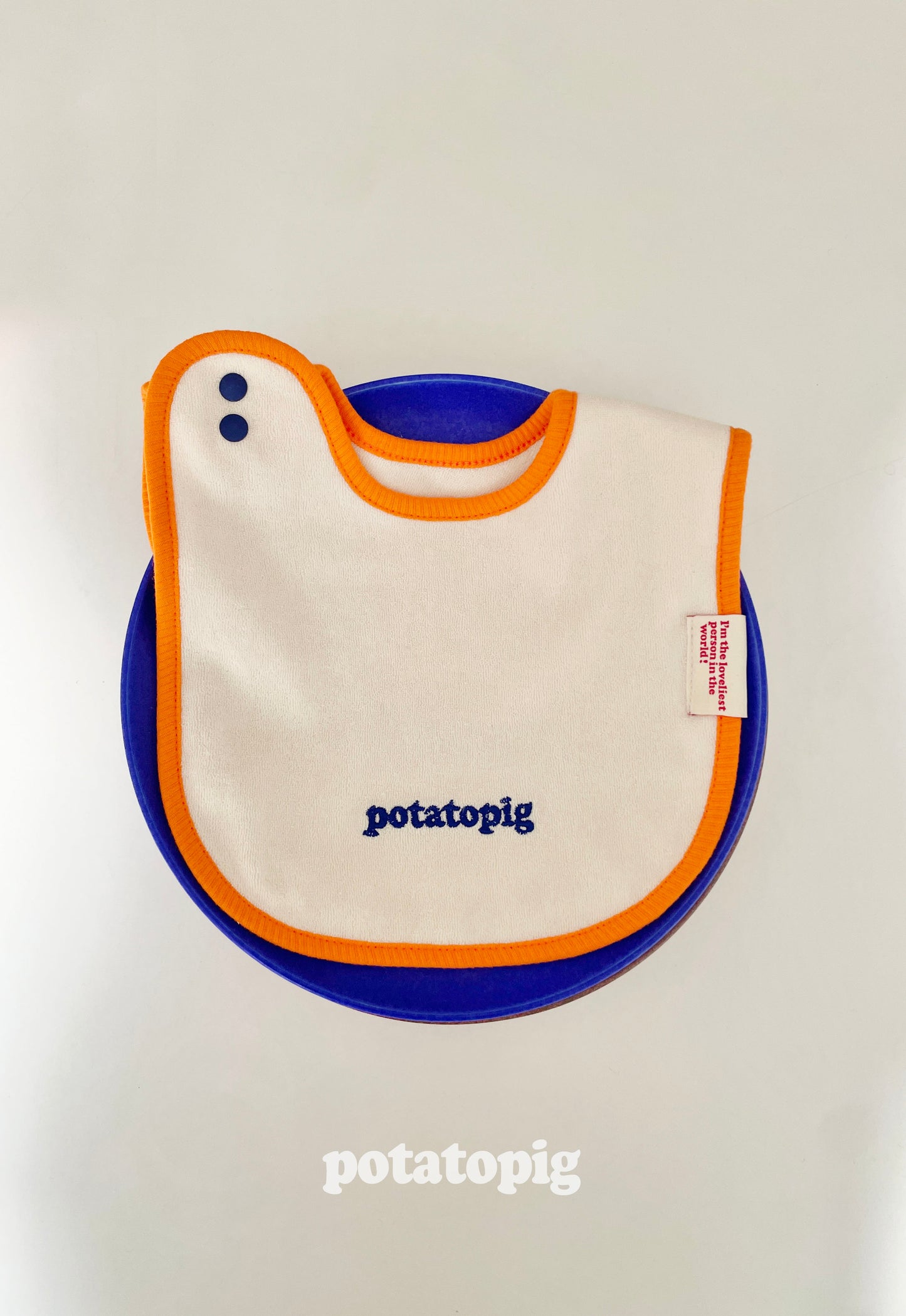 POTATO TERRY BIB - APRICOT