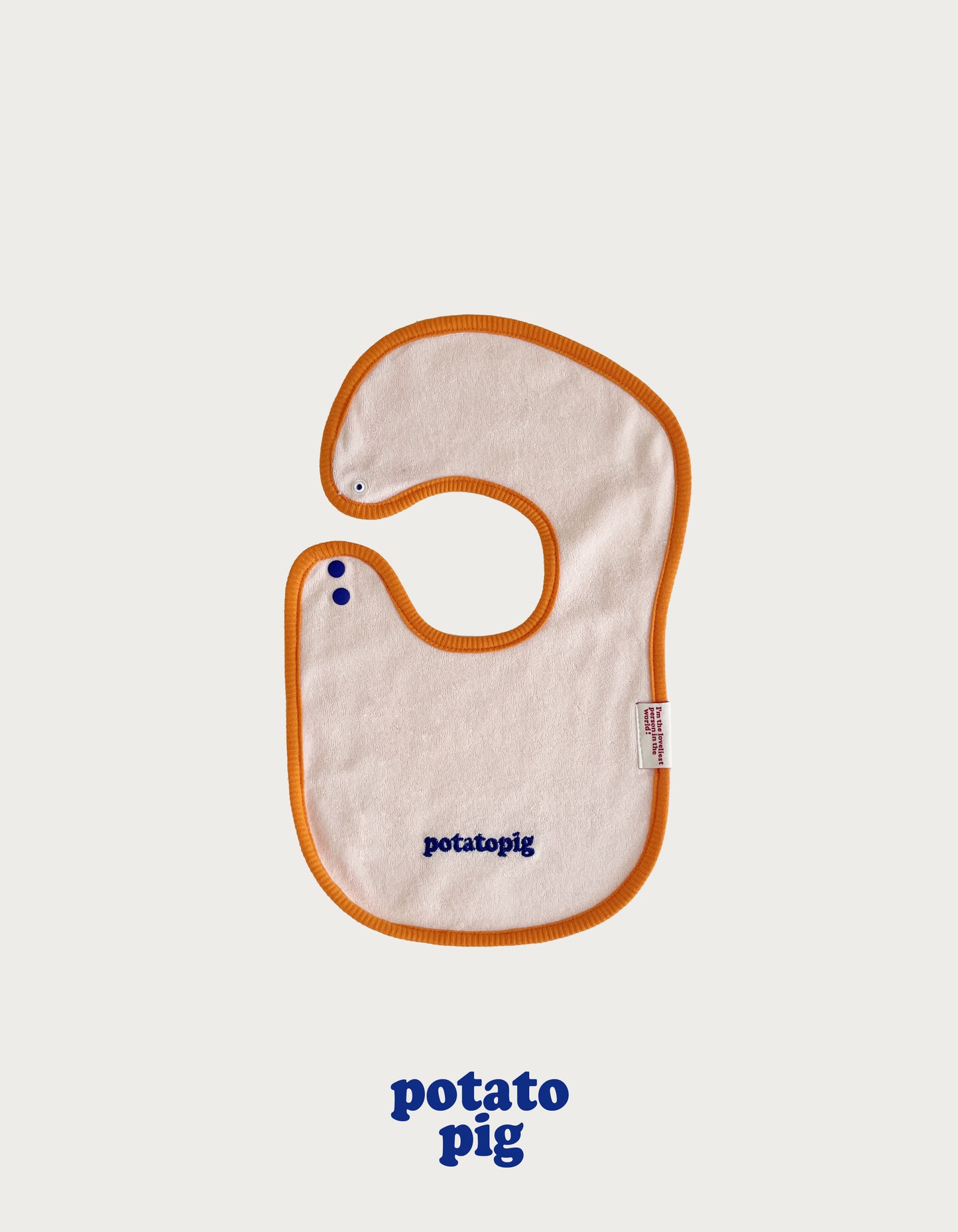 POTATO TERRY BIB - APRICOT